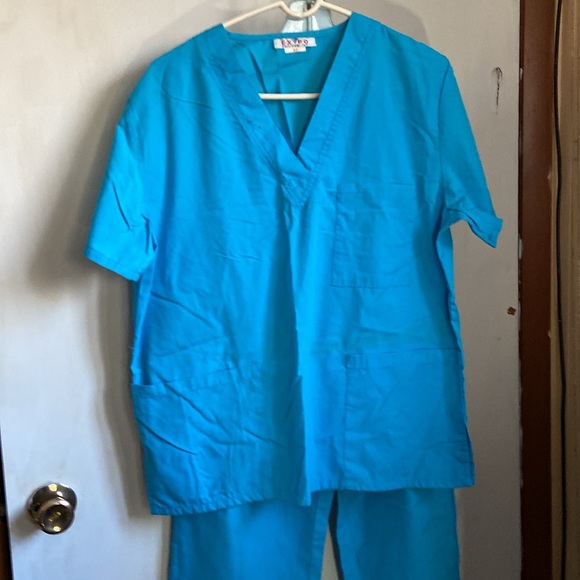 Expo Uniform M blue scrubs NWOT. 39” long legs 44” pit to pit around - Picture 2 of 9